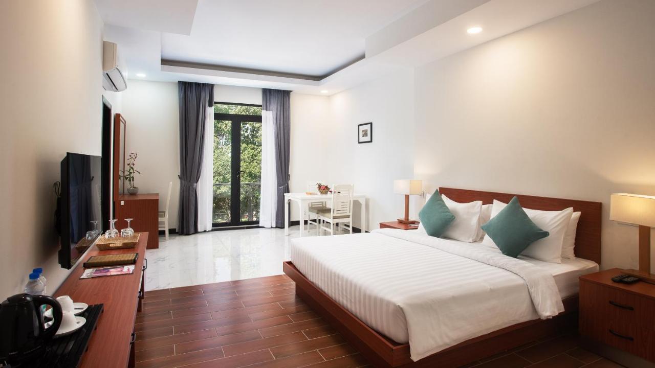 Angkor Sivutha Suites By Alfa Siem Reap Exterior foto